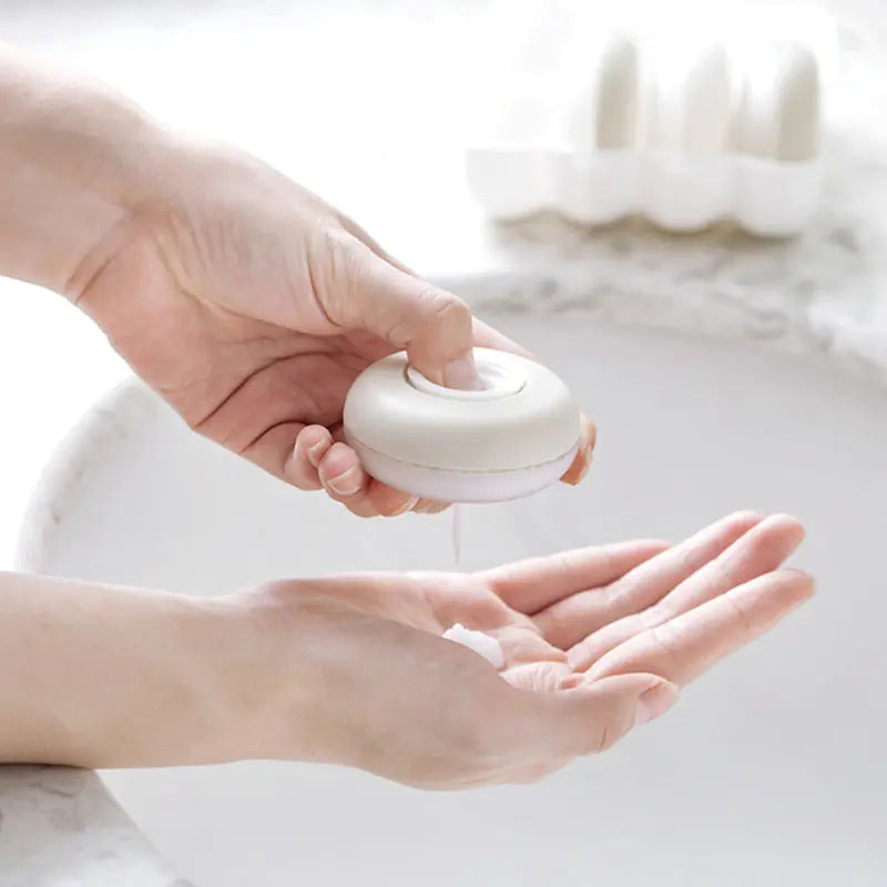 4-Pack Travel Press Bottles for Shampoo and Lotion